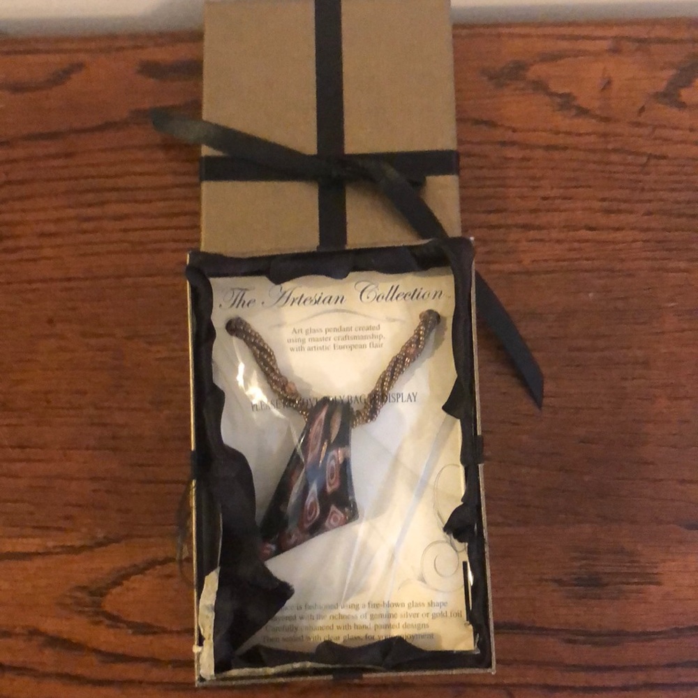Blown glass necklace new in box